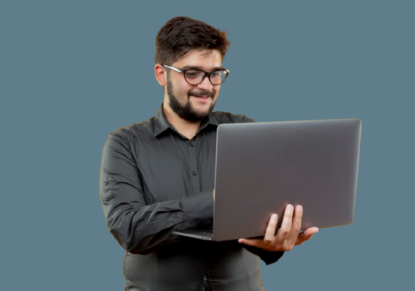 Dedicated Servers 1 pleased young businessman wearing glasses holding used laptop isolated yellow background removebg preview 1